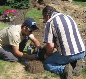 two of our Anthem sprinkler repair techs are in the middle of fixing a brkoen sprinkler system